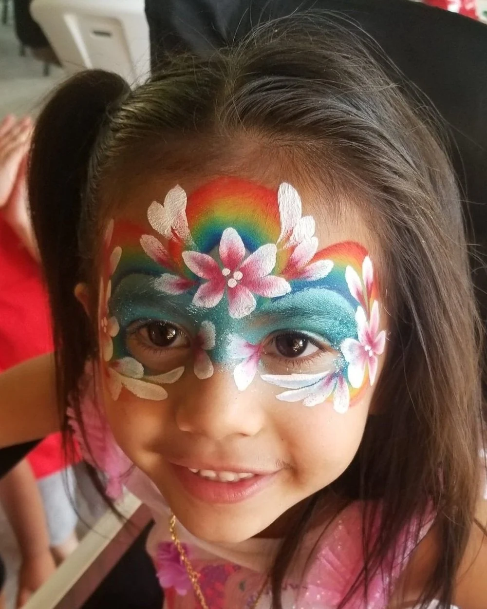 Rainbow flower crown face painting